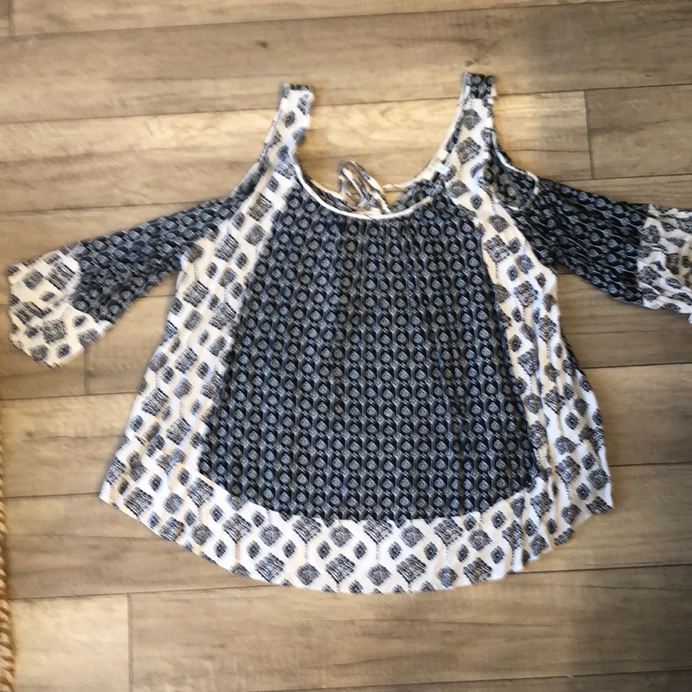 Adorable blue and white cold shoulder top!